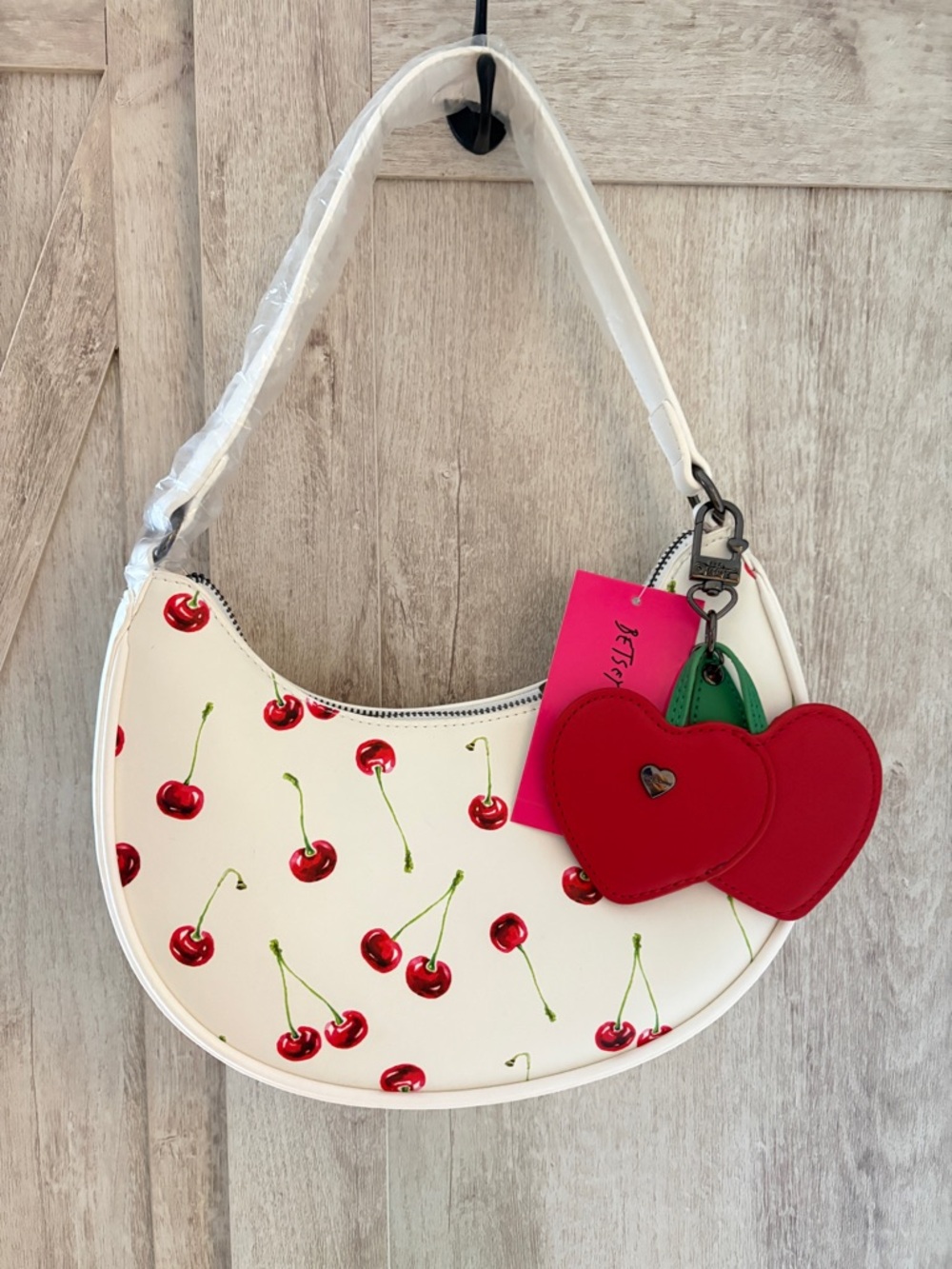 Betsey Johnson White Cherry Print Crescent Shoulder Bag with Red Heart Charm